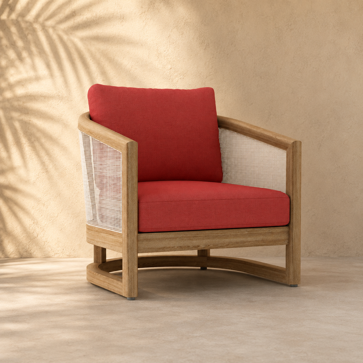Wooden armchair with red cushions against a beige wall