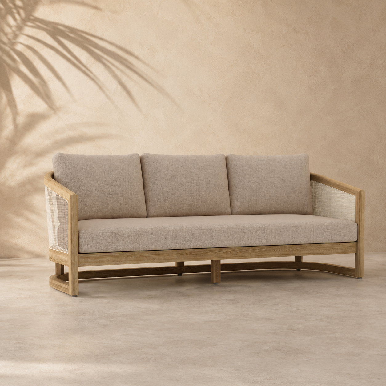 Beige sofa with wooden frame against a beige wall