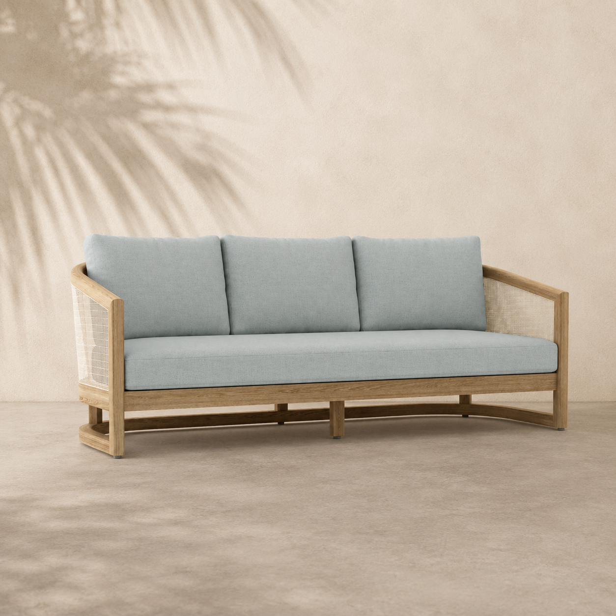 Light blue cushioned sofa with wooden frame on a beige background