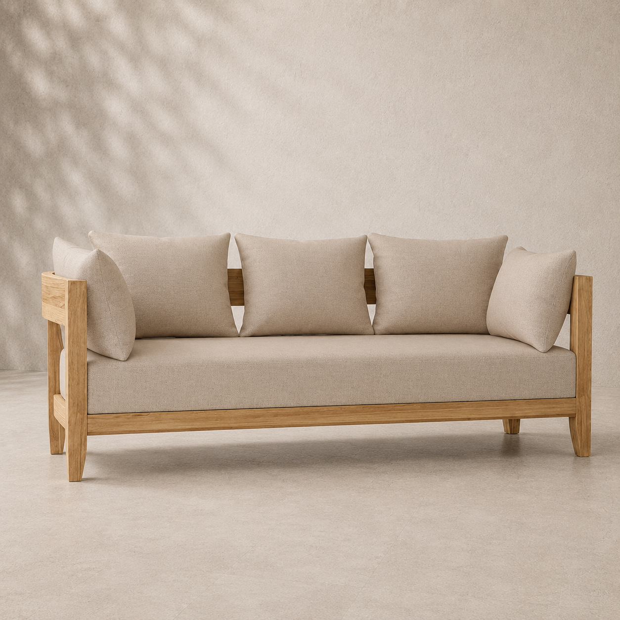 Beige sofa with wooden frame against a beige wall