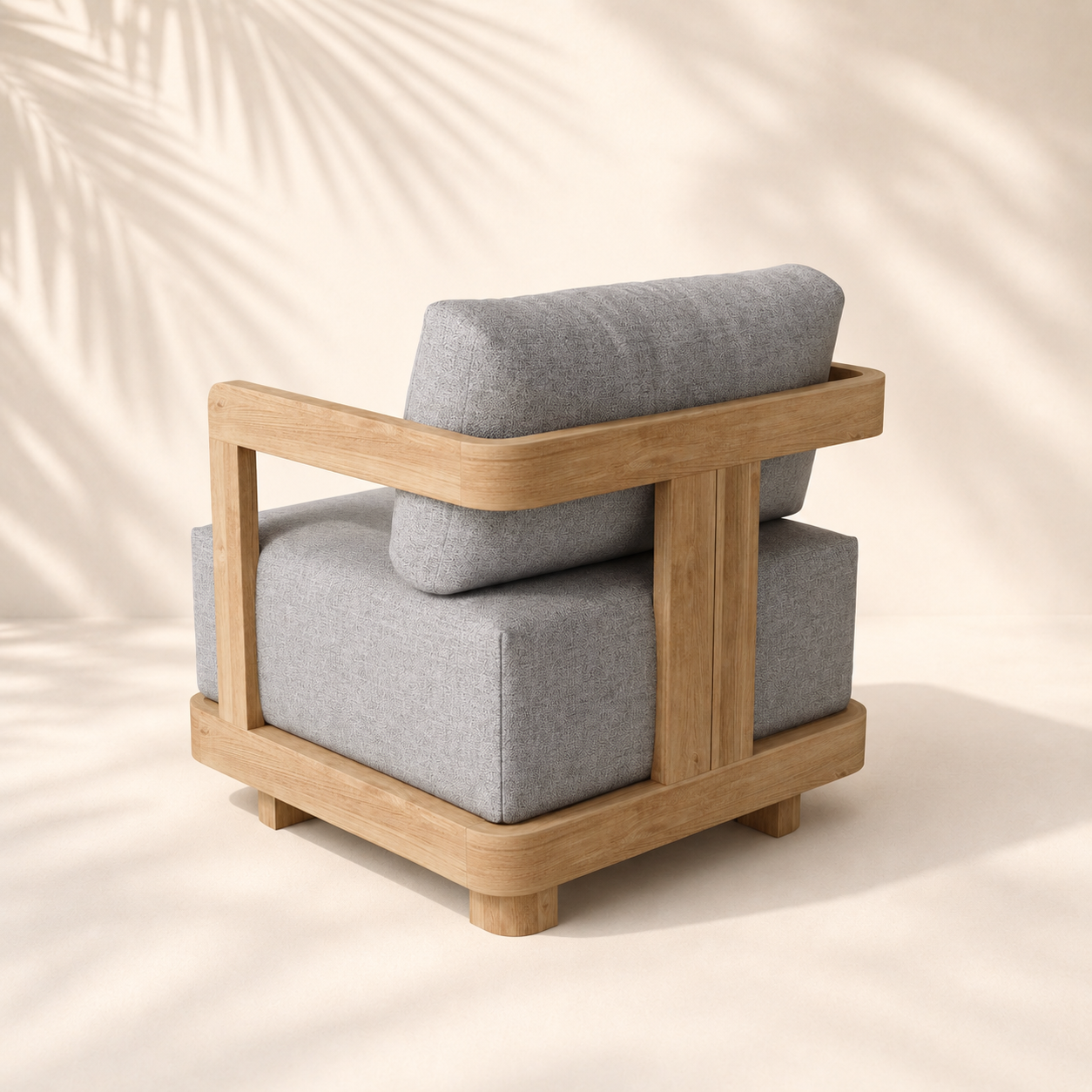 Modern armchair with wooden frame and gray cushions on a beige background