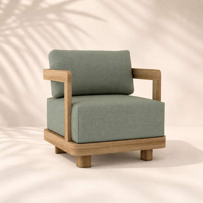 Modern armchair with wooden frame and green cushions on a neutral background