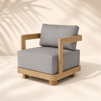 Gray cushioned armchair with wooden frame on a beige background