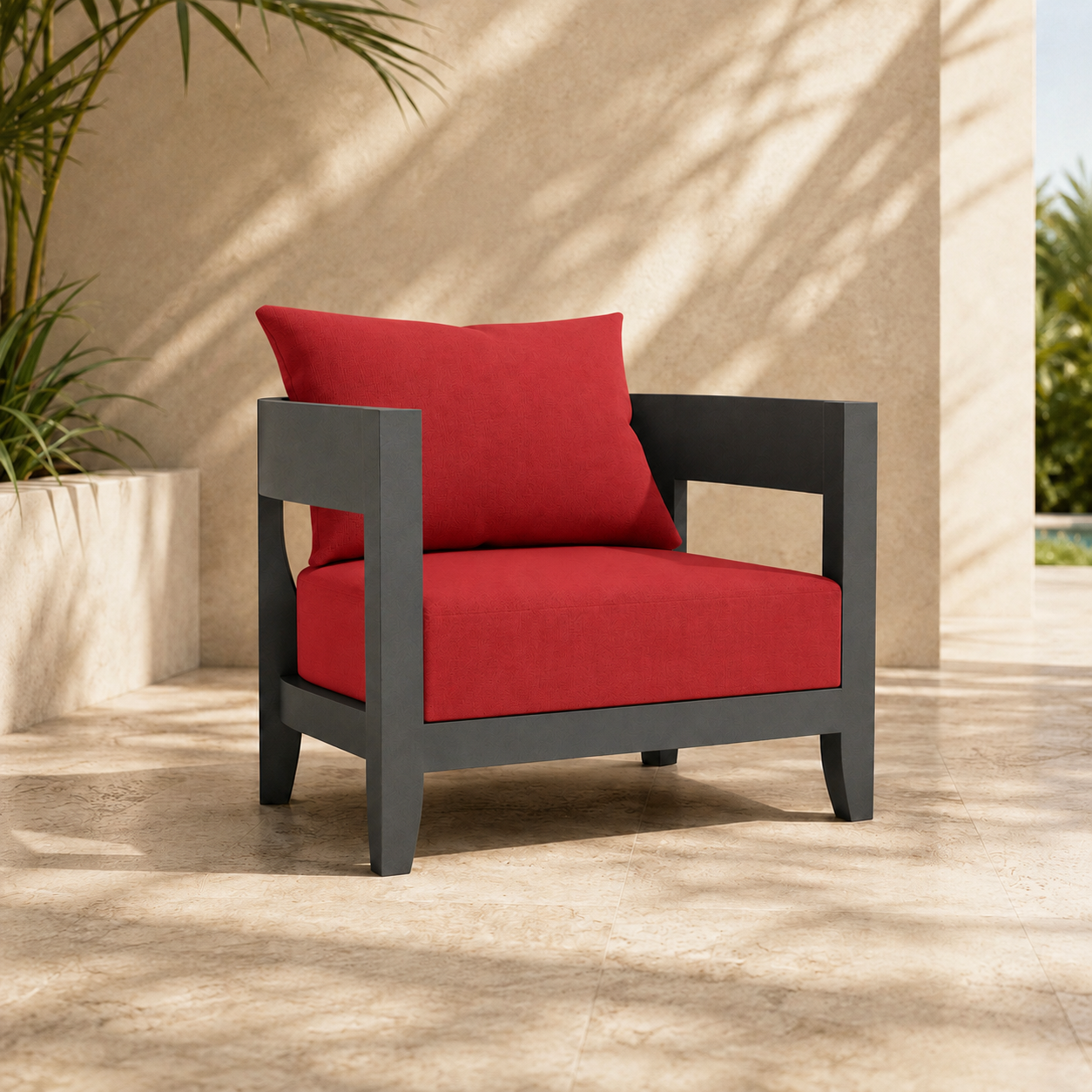 Red cushioned chair with black frame on a wooden floor with plants in the background