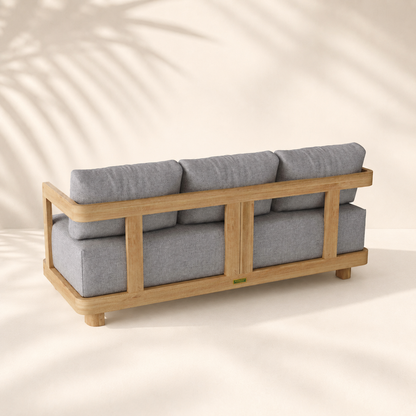 Gray cushioned sofa with wooden frame on a beige background