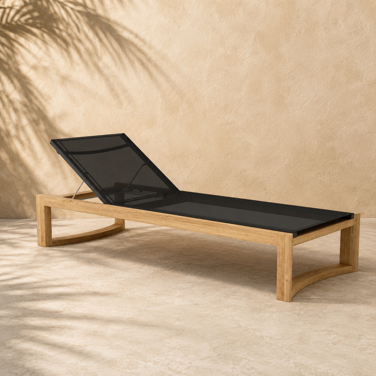 Wooden sun lounger with black mesh seat against a beige wall